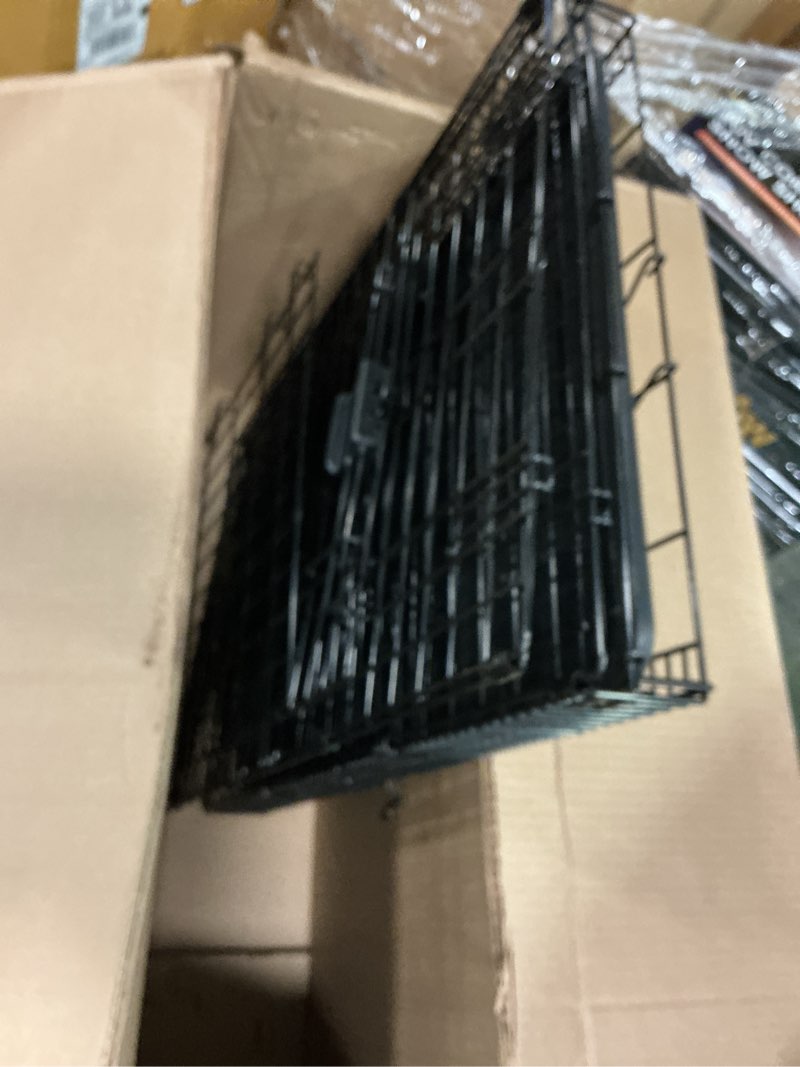 Condition photo showing As Is for Amazon Basics Durable, Foldable Metal Wire Small Dog Crate with Tray, Single Door, 24 x 18 x 20 in, Black 24 x 18 x 20 in Single Door w/ Divider