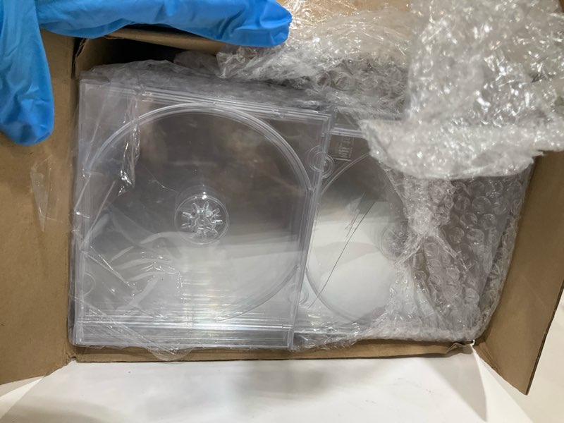Condition photo showing As Is for leifide 50 pieces 10.4 mm plastic cd jewel case clear single dvd disc case standard cd dvd cover for protection replacement (clear) 10.4 mm clear