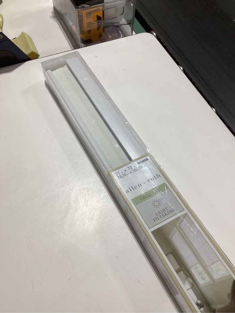 Condition photo showing Good Condition for allen + roth 31-in x 72-in white light filtering cordless cellular shade. incomplete