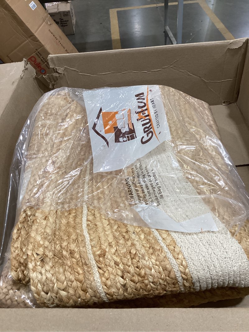 Condition photo showing Good Condition for GRUHUM 6' ft Round Jute Cotton Area Rug - Natural Fiber Handmade Boho Charm Farmhouse Jute Area Rug Soft Braided Rustic Vintage Reversible Indoor Outdoor Kitchen Bedroom Living Room Hallways Enterway 6' (Round) Natural- 14