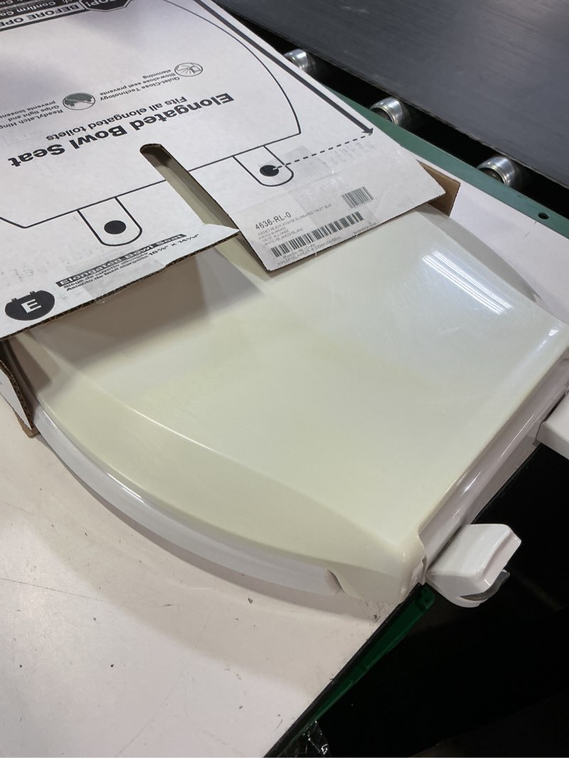 Condition photo showing As Is for kohler 4636-rl-0 cachet readylatch elongated slow close toilet seat, soft close toilet seat quiet lid, contoured grip-tight bumpers installation hardware, apartment essentials, white white elongated ready latch