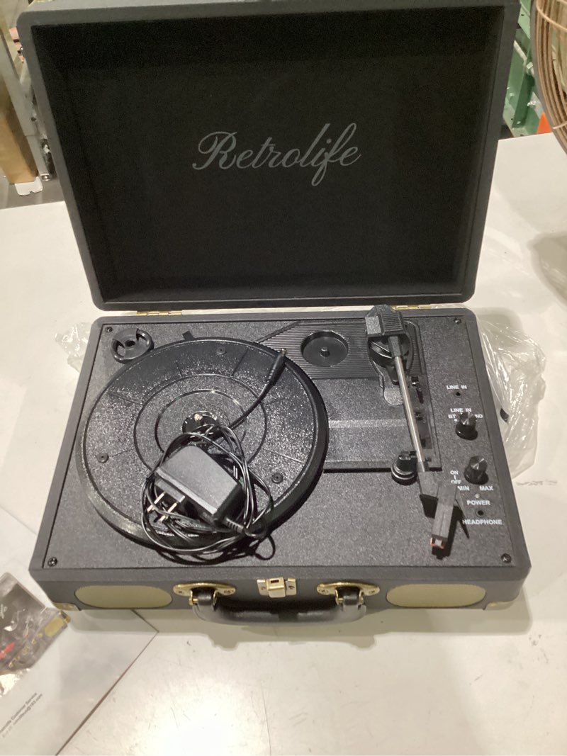 Condition photo showing As Is for vinyl record player 3-speed bluetooth suitcase portable belt-driven record player with built-in speakers rca line out aux in headphone jack vintage turntable black