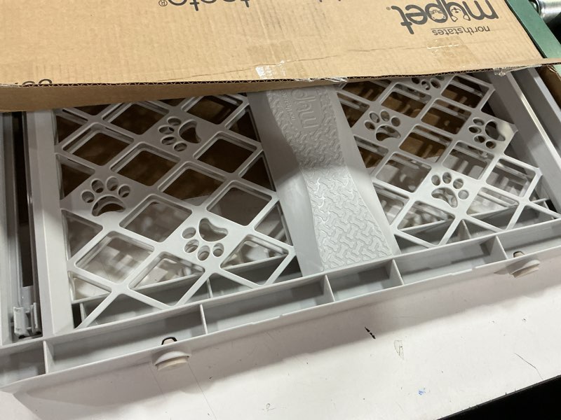 Condition photo showing As Is for MYPET North States Paws Portable Pet Gate: 26-40" Wide. Pressure Mount. No Tools Needed. Made in USA. Dog Gate 23" Tall, Expandable, Durable Dog Gates for Doorways, Light Gray