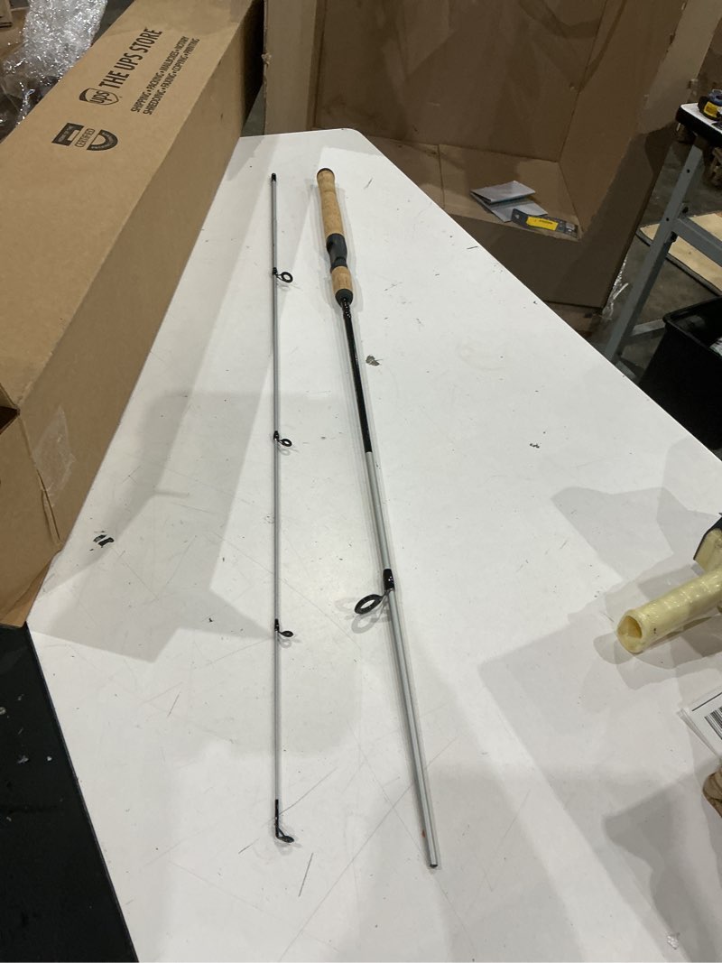 Condition photo showing As Is for shakespeare cirrus 6'6" spinning fishing rod and reel combo, 2-piece graphite rod blank, size 30 spinning reel, pre-spooled with monofilament fishing line
