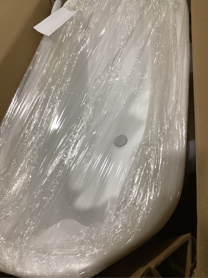 Condition photo showing Good Condition for 30”x59” acrylic freestanding bathtub in a glossy white finish.