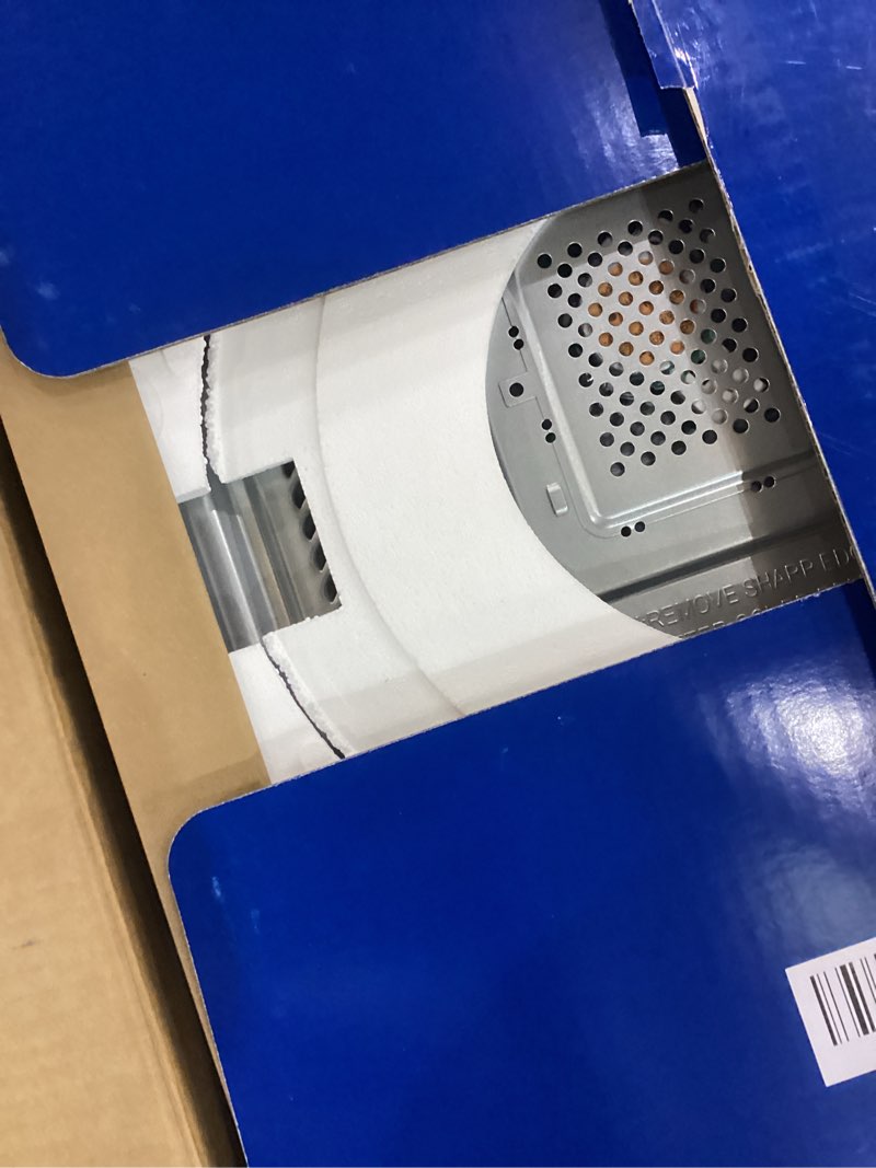 Condition photo showing As Is for GE Countertop Microwave Oven,1, 200-watt Capacity, 2.0 Cubic Ft., 8 Auto Setting Cooking Settings, Child-Lock Technology, Kitchen Essentials for the Countertop, Dorm Room or Apartment, Stainless Steel 2.0 Cu.Ft. Stainless Steel