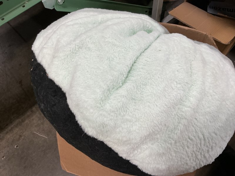 Condition photo showing As Is for (similar)urban shop long hair xl pouf, white