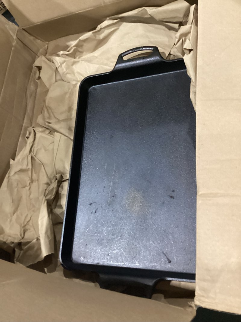 Condition photo showing As Is for lodge cast iron baking pan