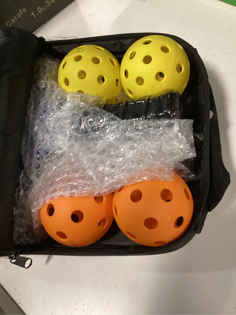 Condition photo showing item condition for niupipo Pickleball Paddles Set of 2/4/1, USAPA Approved Graphite Carbon Fiber Pickleball Rackets, Polypropylene Honeycomb Core, Cushion 4.72In Grip, Bag/Cover, Pickle Ball Paddle Set for Men Women Black & Blue