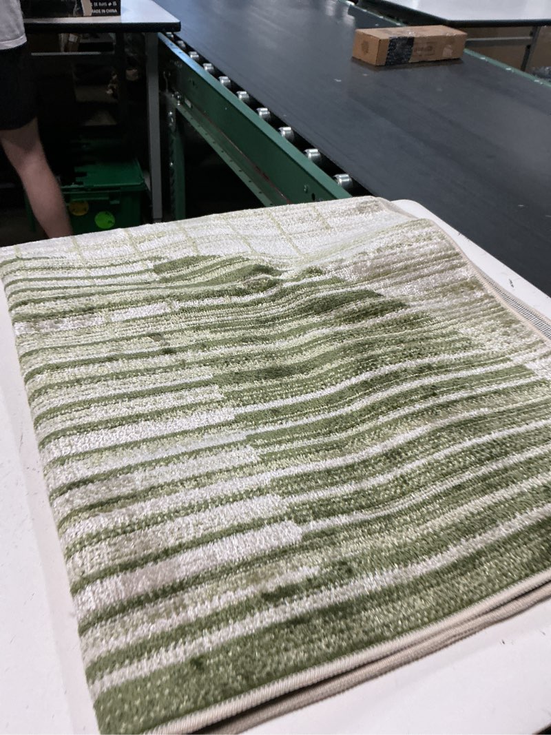 Condition photo showing Good Condition for (unknown size)nourison home astra machine washable ivory olive 6'7\" x 9' area rug - easy clean, non shedding, bed room, living room, dining room, kitchen (7' x 9') 6'7\" x 9' (rectangular) ivory olive