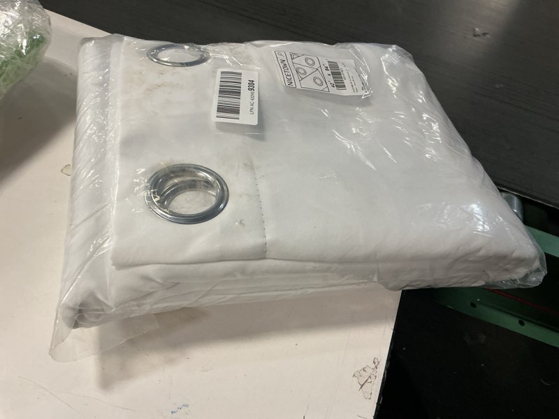 Condition photo showing Good Condition for NICETOWN White Blackout Curtains 84 inches Long, Full Light Blocking Drapes with Black Liner for Nursery, Thermal Insulated Draperies for Hall, Villa (2 Pieces, 42 inches Wide Each Panel, Pure White) Pure White 42"W x 84"L (Pack of 2)