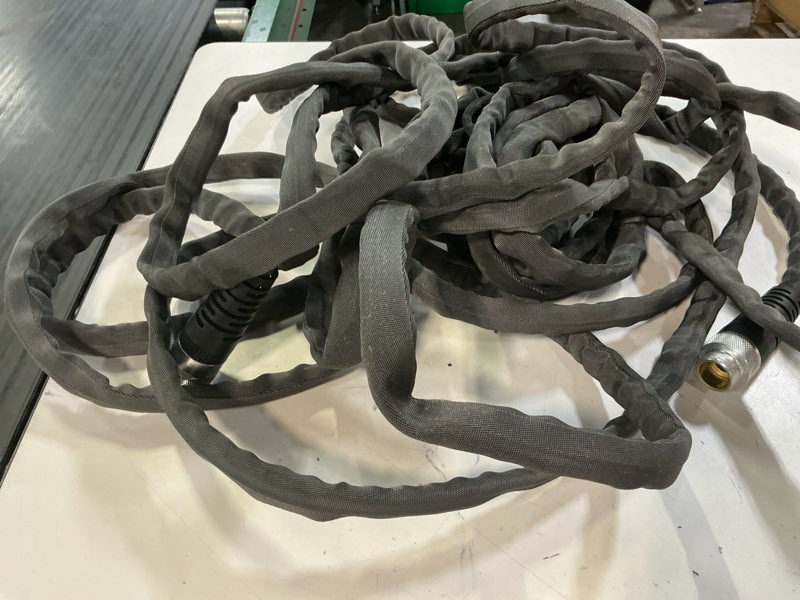 Condition photo showing As Is for zero-g teknor apex 5/8-in x 50-ft premium kink free woven gray hose
