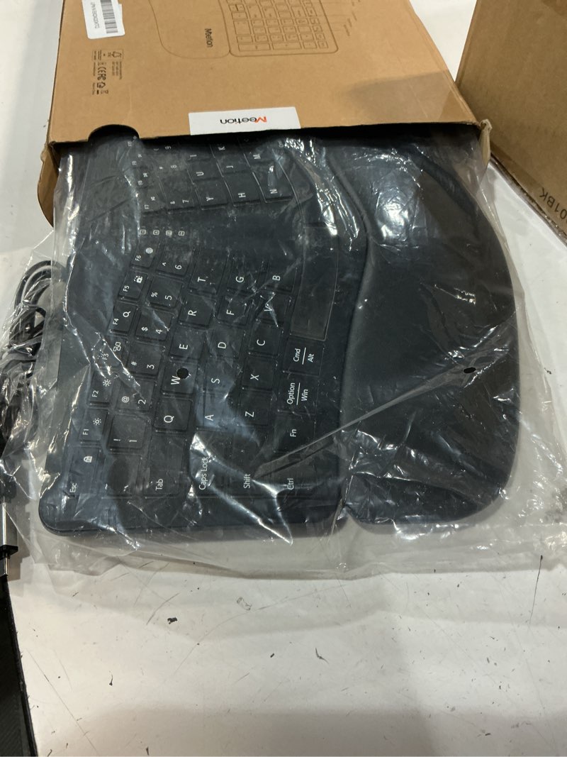 Condition photo showing Good Condition for meetion ergonomic keyboard wired, 7 colors transparent backlit, 4 brightness, 1 rgb breathing backlit, comfortable wrist rest cushion, usb-a/usb-c adapter ergo keyboard for windows mac computer laptop black