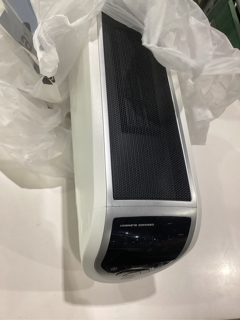Condition photo showing As Is for lasko oscillating digital ceramic tower heater for home with overheat protection, timer and remote control, 22.75 inches, 1500w, white, 5165, medium, not tested