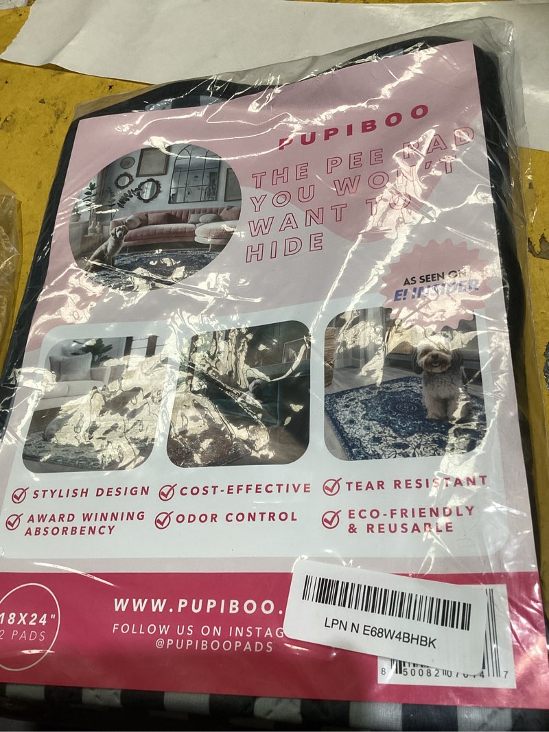 Condition photo showing Good Condition for pupiboo washable pee pads for dogs and cats - super absorbent reusable puppy training pads - 100% waterproof, leak-proof & non-slip whelping pads for pet housebreaking wavy black white 18 x 24 inch (pack of 2)