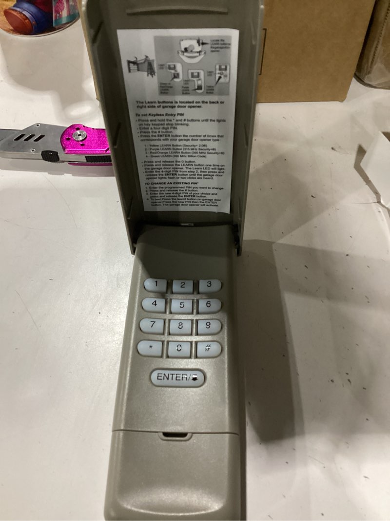 Condition photo showing Good Condition for universal garage door opener keypad compatible with liftmaster chamberlain craftsman opener with purple yellow red orange green learn button wireless keypad replacement (gray)
