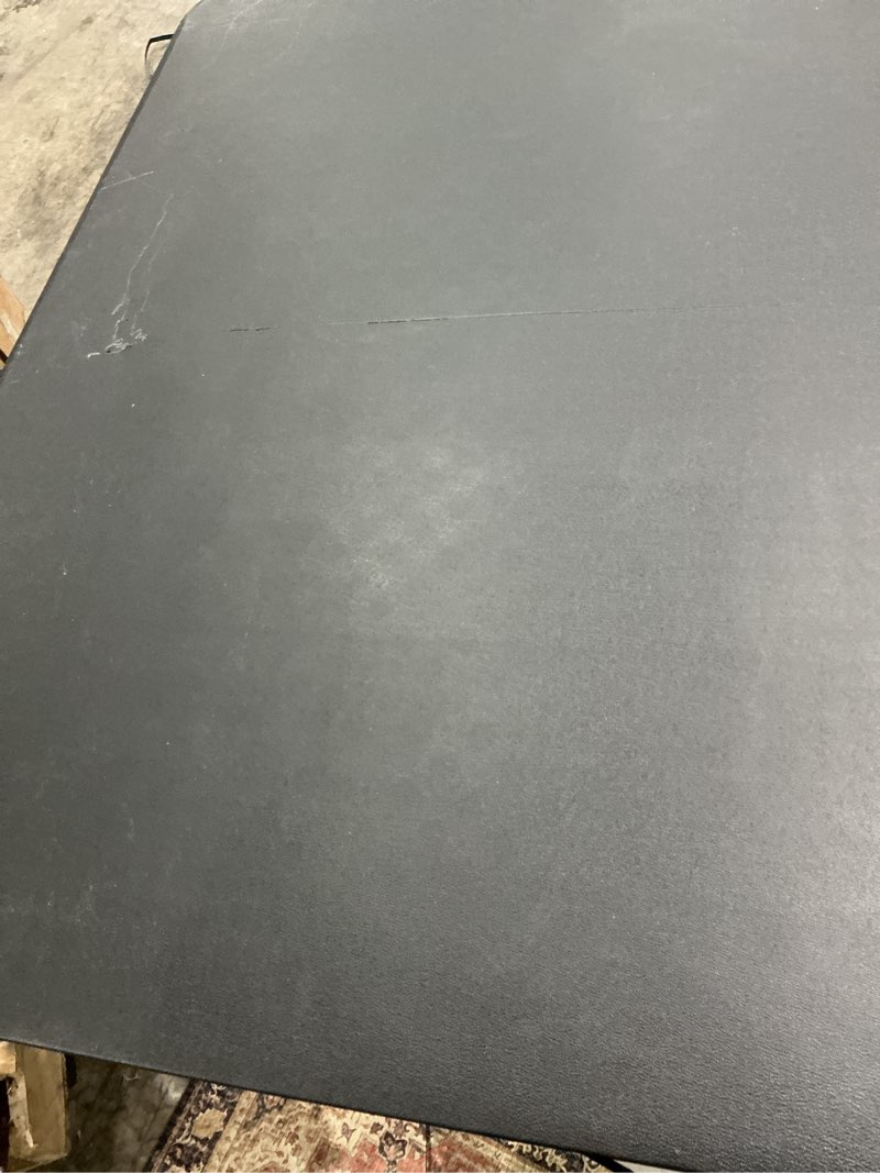 Condition photo showing As Is for mainstays 6 foot bi-fold plastic folding table, black