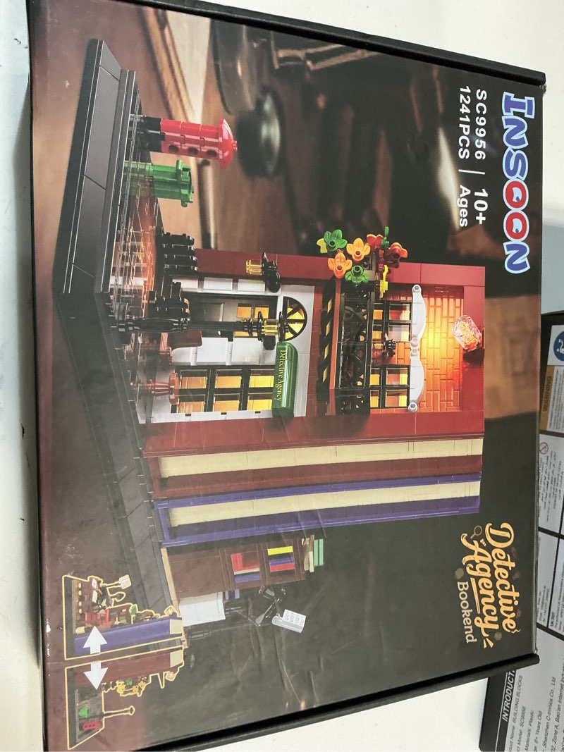 Condition photo showing New/Like New for Detective Bookend Building Set with Lights, 1241 PCS Detective Agency Street House Building Block Kit for Home Decor Bookshelf, Collectible Mystery Bookstand Model for Adults Boys Girls Age 12+