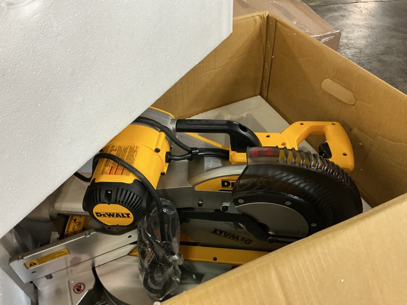 Condition photo showing As Is for dewalt 15 amps 12 in. corded dual-bevel sliding compound miter saw