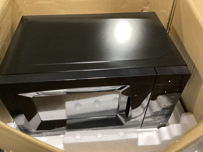 Condition photo showing New/Like New for comfee' em720cpl-pmb countertop microwave oven with sound on/off, eco mode and easy one-touch buttons, 0.7cu.ft, 700w, black