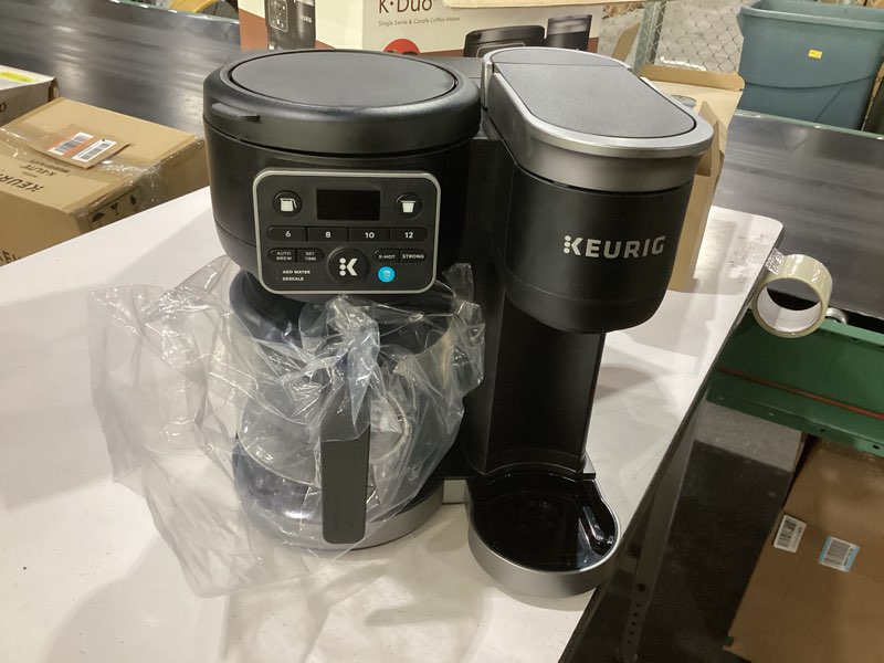 Condition photo showing As Is for **missing tray piece*not tested**keurig k-duo hot & iced single serve & carafe coffee maker, multistream technology, 72oz reservoir (gen 2)