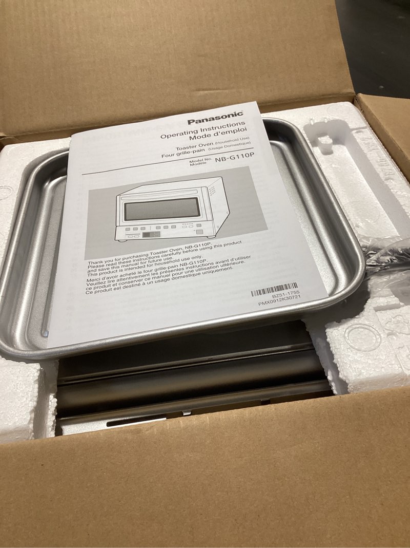 Condition photo showing As Is for Panasonic FlashXpress Toaster Oven Countertop, 4-Slice Small Toaster Oven Compact Size with Double Infrared Heating, 6 Auto Cook Options and Precise Temperature Control, 1300W - NB-G110P (Silver) FlashXpress Compact Matte Silver