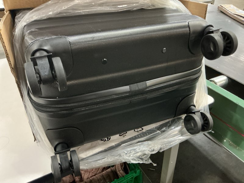 Condition photo showing Good Condition for Amazon Basics 26" Hardside Medium Checked Luggage, Hardshell Suitcase With Wheels, Expandable For Up to 15% More Space, With Scratch-Resistant Surface, Four Multi-directional Wheels, Black Black Medium Checked