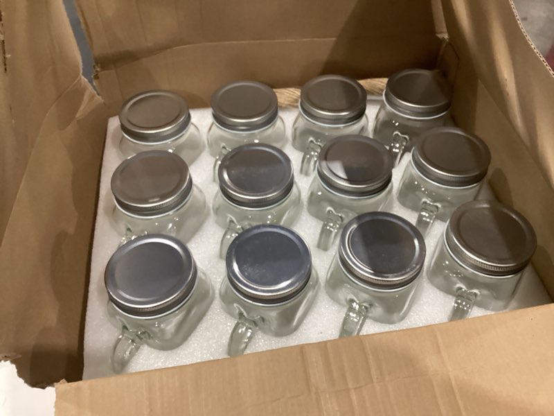 Condition photo showing Good Condition for 16 oz mason jars with handle,old fashioned drinking glasses with chalkboard labels and silver metal lids,glass mugs for party or daily use,set of 12.