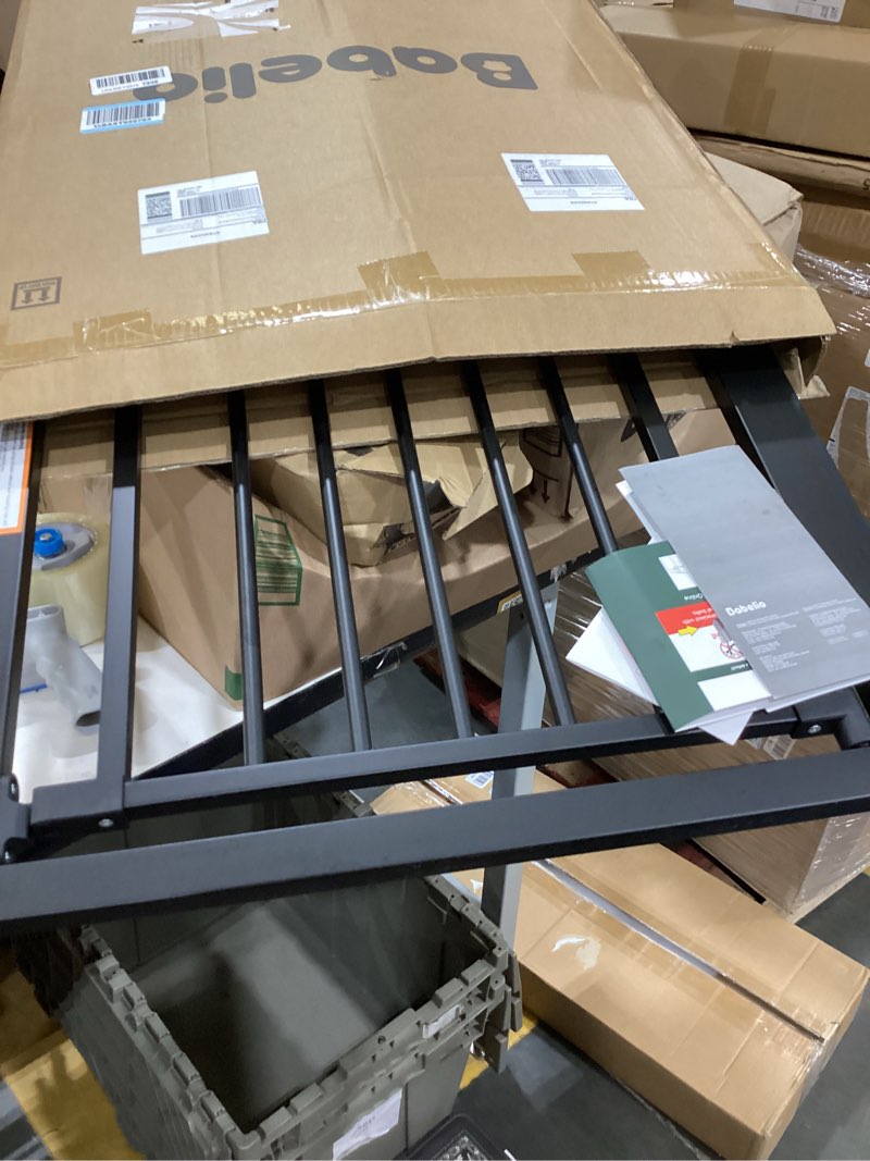 Condition photo showing item condition for BABELIO 26-28.5 Inch Narrow Easy Install Baby Gate, Auto-Close Pet Gate for Small Stairs and Doorways, NO Drilling Pressure Mounted, NO Extensions, Black Black 30" High, 26-28.5" Wide