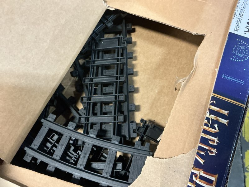 Condition photo showing As Is for Lionel Hogwarts Express Battery O Gauge Toy Train Set with Remote, Locomotive, Train Cars, & Track with Authentic Train Sounds, Lights, & Water Vapor Smoke Effects for Kids 4+