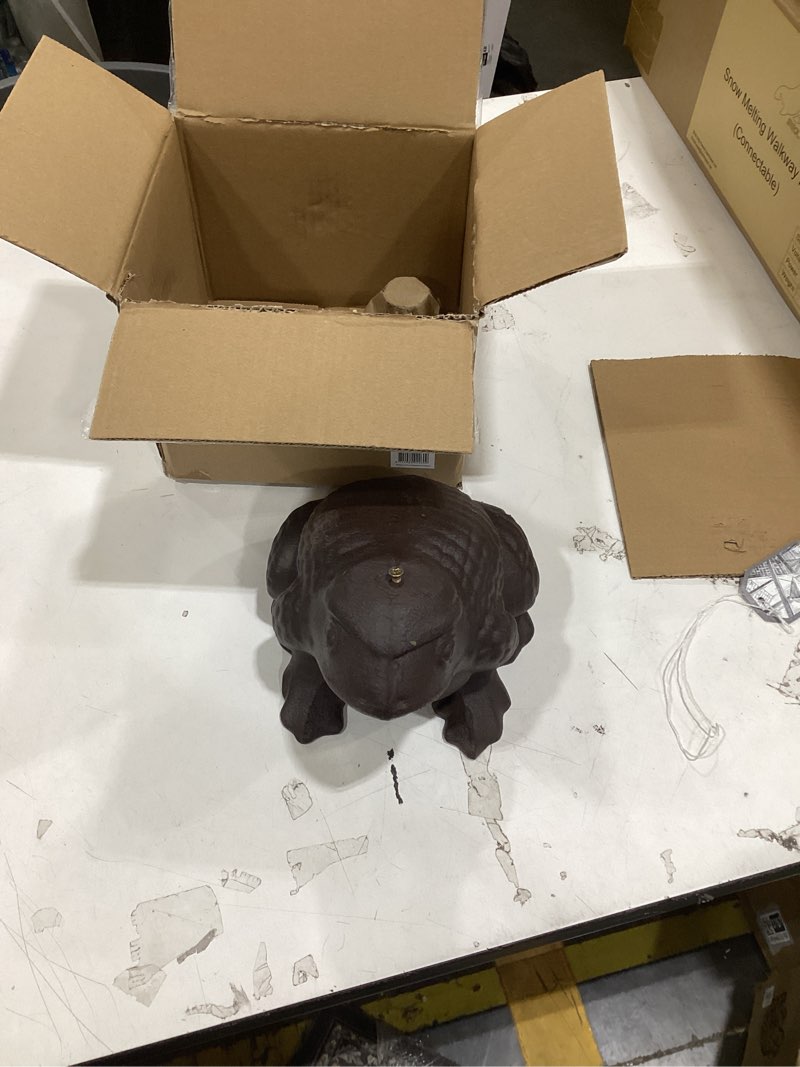 This item is a decorative cast iron frog garden statue that can also function as a key hider.  