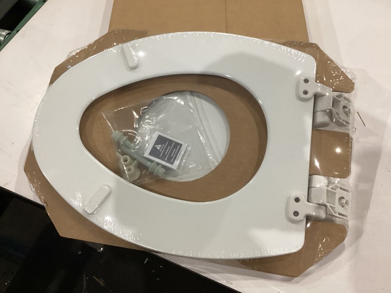 Condition photo showing New/Like New for mayfair linden slow close toilet seat, non slip heavy duty wood, easy install, elongated, white
