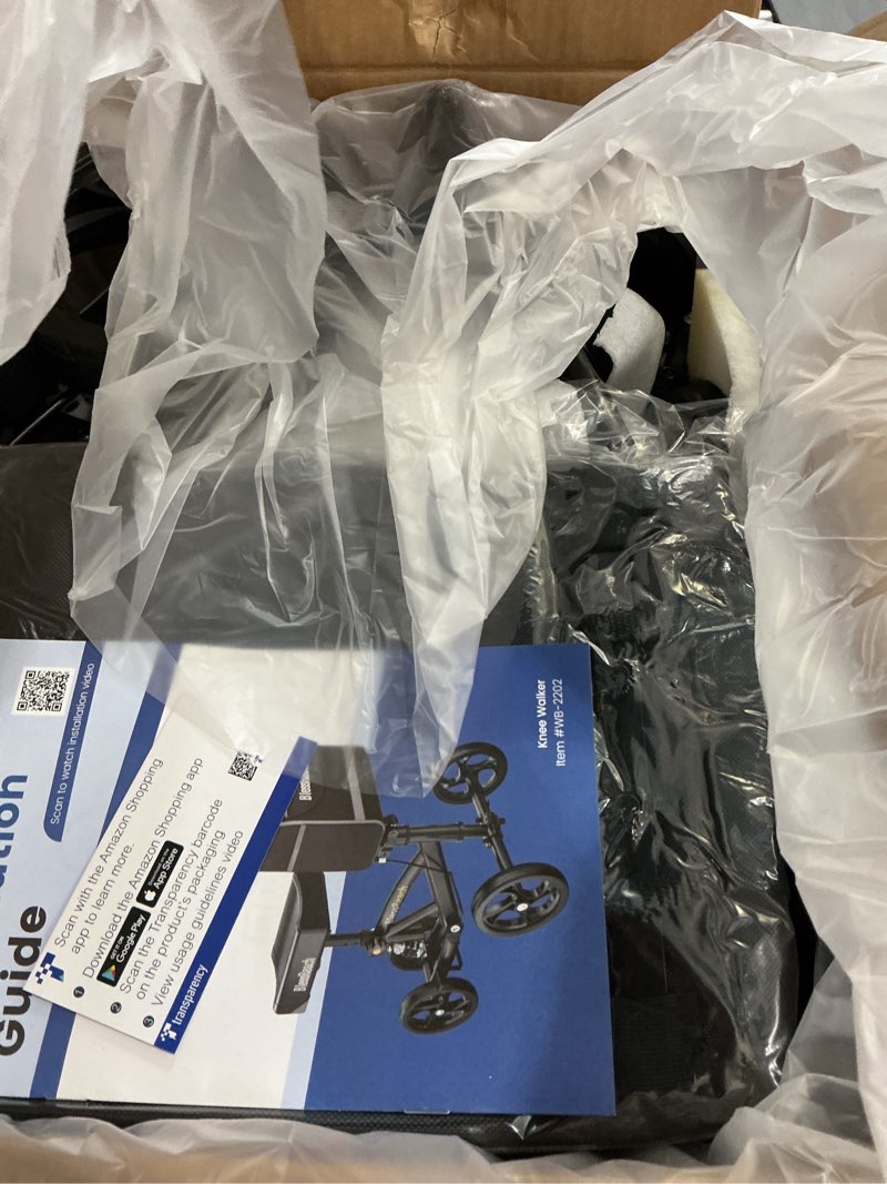 Condition photo showing New/Like New for steerable knee walker deluxe medical scooter for foot injuries compact crutches, with dual rear on-wheel brake and shock absorption under the knee pad, black