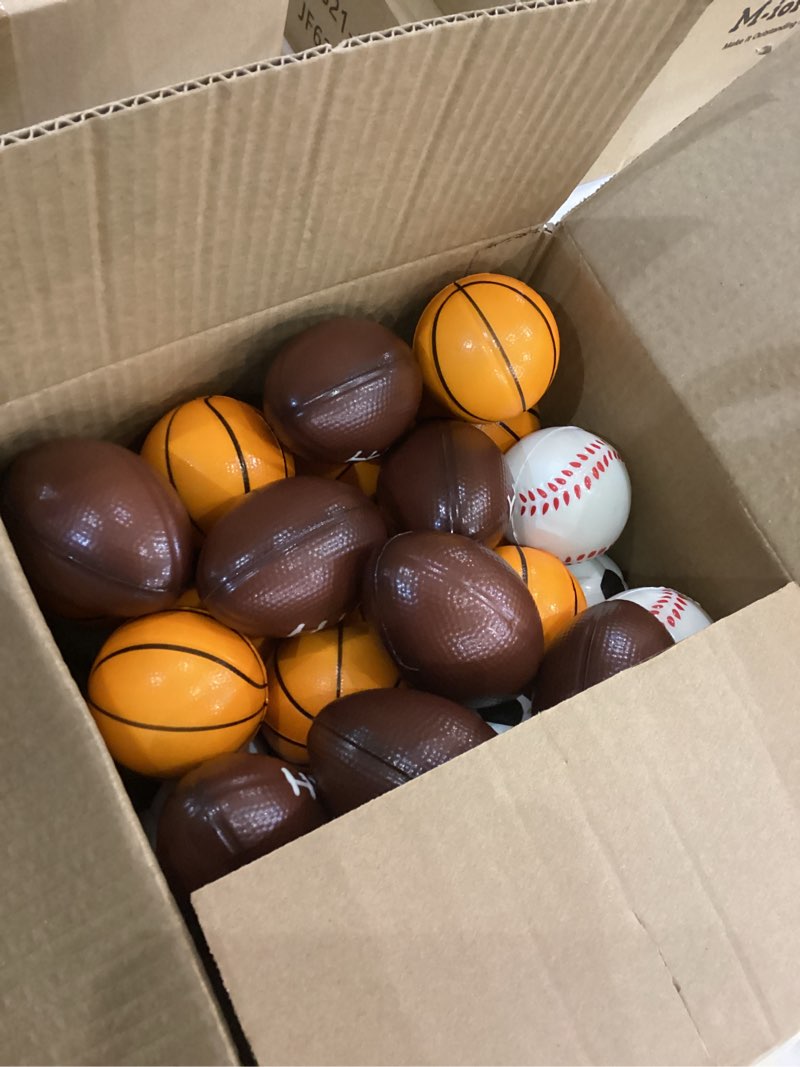 Condition photo showing New/Like New for Squeeze toys 4 kinds of balls