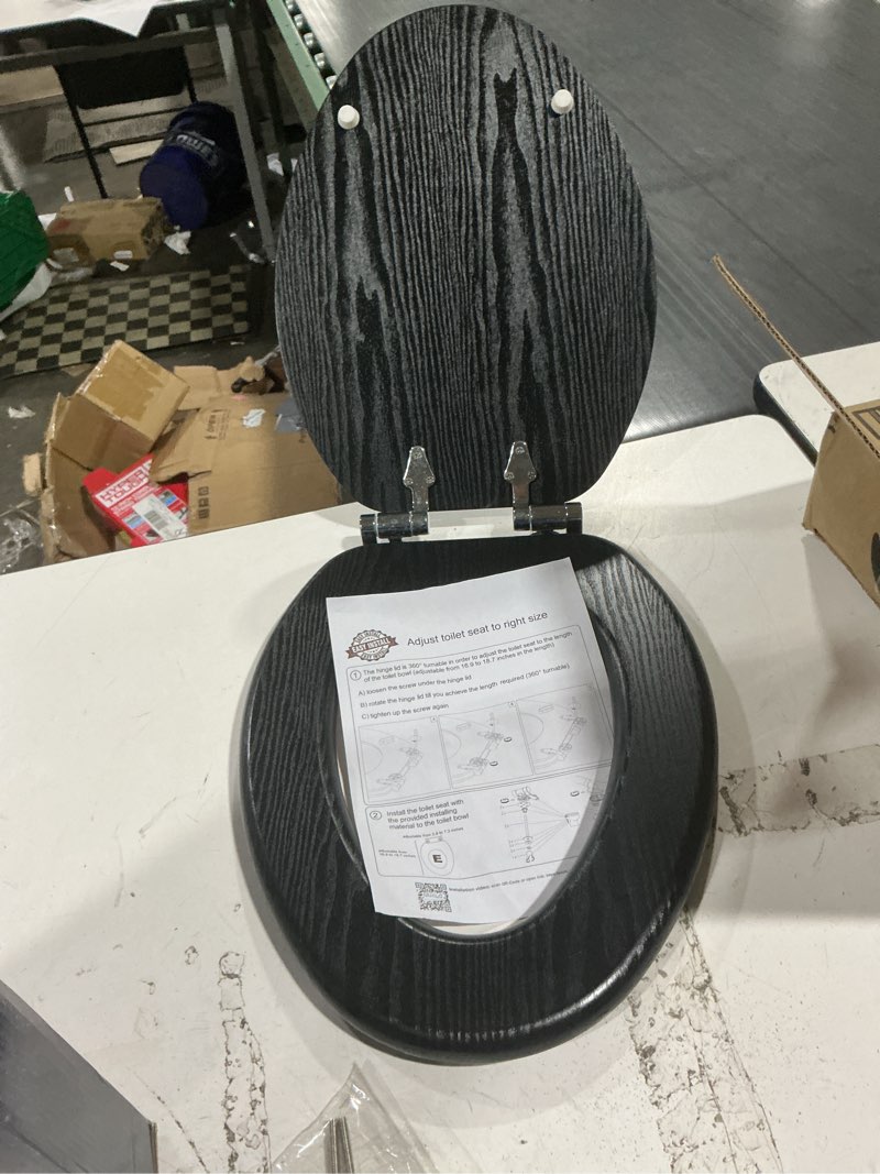 Condition photo showing Good Condition for durable molded wood toilet seat in black