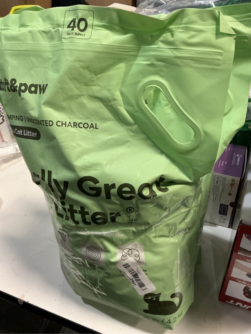 Condition photo showing Good Condition for tuft & paw really great cat litter, low tracking tofu cat litter, clumping