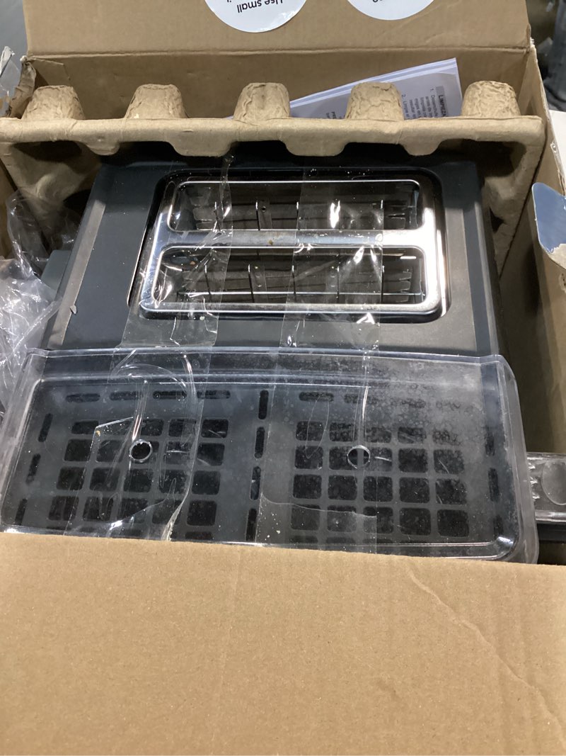 Condition photo showing As Is for West Bend Breakfast Station 2-Slice Toaster and Egg Cooker/Poacher with Removable Pre-Cooked Meat and Vegetable Warming Tray for Perfect Breakfast Sandwiches, 1200-Watts, Black