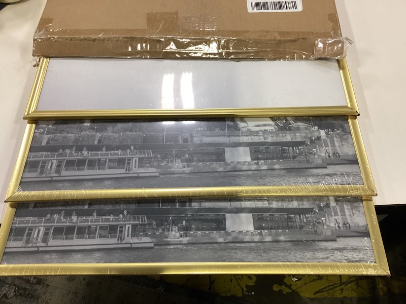 Condition photo showing Good Condition for upsimples 16x24 Picture Frame Gold 3 Pack, Scratch-Proof Poster Frames 16 x 24 for Photo Gallery - Slide-In Strips, Horizontal or Vertical Wall Mounting Gold 16x24
