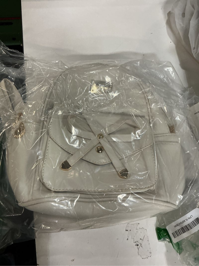 Condition photo showing Good Condition for I IHAYNER Girls Bowknot Cute Leather Backpack Mini Backpack Purse for Women Beige