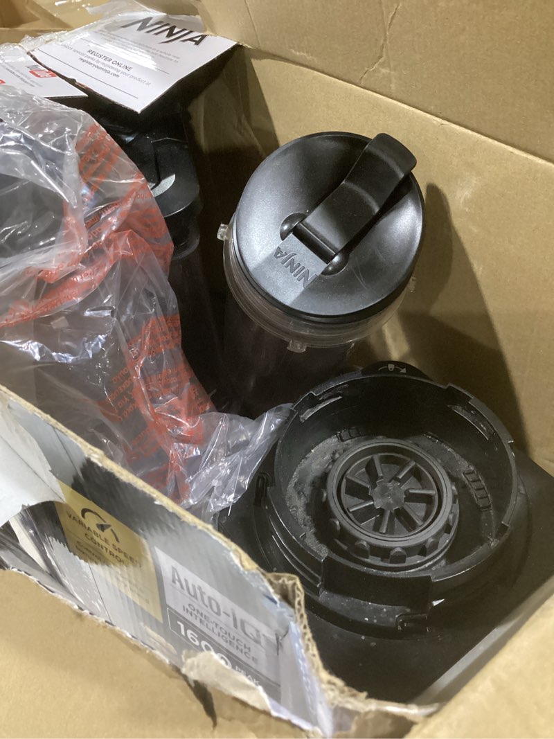 Condition photo showing As Is for Ninja BL642 Nutri Ninja Personal & Countertop Blender with 1200W Auto-iQ Base, 72 oz. Pitcher, and 18, 24, & 32 oz. To-Go Cups with Spout Lids, For Smoothies, Shakes & More, Dishwasher Safe, Black