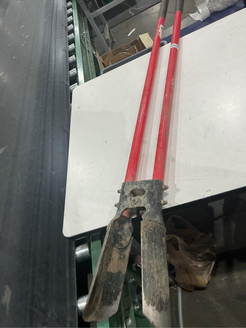 Condition photo showing As Is for steel post hole digger