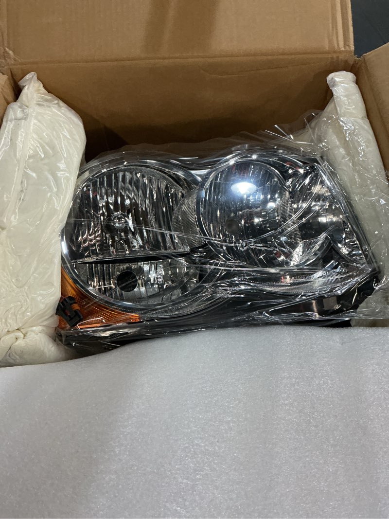 Condition photo showing New/Like New for headlights assembly replacement for jeep grand cherokee 2008 2009 2010, chrome with amber reflector chrome 2008-2010