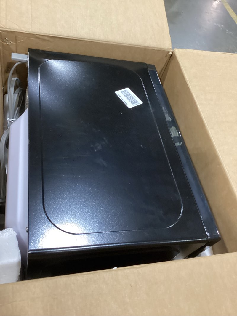 Condition photo showing As Is for black+decker em720cb7 digital microwave oven with turntable push-button door, child safety lock, 700w, stainless steel, 0.7 cu.ft 0.7 cu. ft.