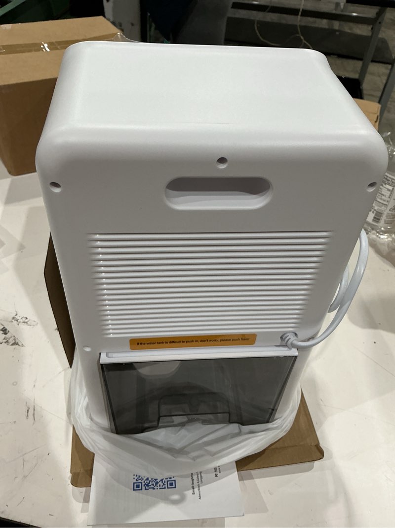 Condition photo showing Good Condition for dehumidifier for home up to 1000 sq.ft, 98oz small quiet dehumidifier with drain hose, 3 timer modes, auto shut off, aromatherapy & 7 color light for bedroom, bathroom, basement (deep white) deep white deep white