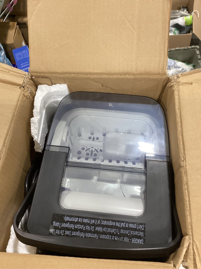 Condition photo showing As Is for HiCOZY Clear View Ice Maker Countertop, Self-Cleaning Ice Machine with Ambient Lights, Ice in 6Mins, 26 lbs/Day, 2 Sizes of Bullet Ice for Apartment/Kitchen/Office/Home Bar(Black) 12.4"D x 11.3"W x 9.5"H Black 1