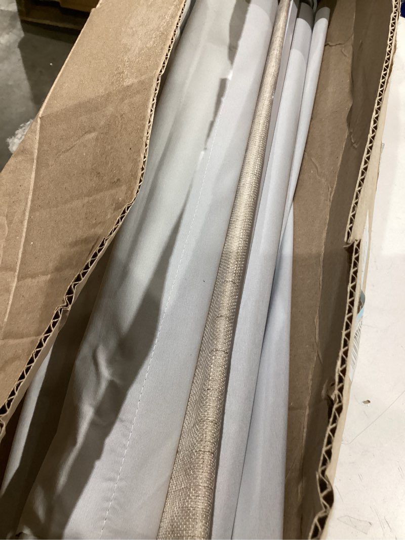 Condition photo showing As Is for sun zero seraphina textured 100% total blackout cordless roman shade, taupe, 27" w x 64" h taupe 27"w x 64"h
