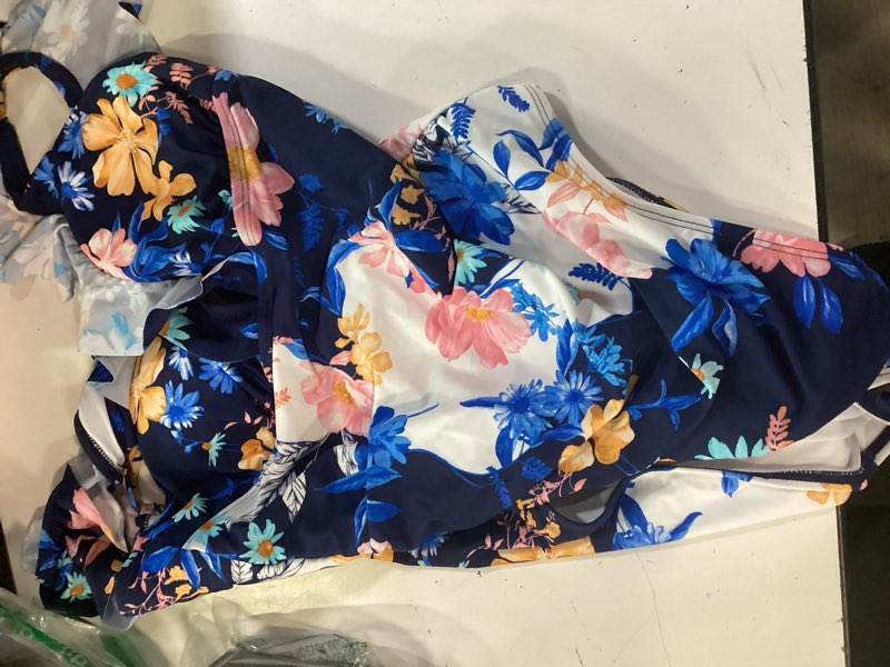 Condition photo showing Good Condition for cupshe women's ruffled one piece swimsuit v neck lace up navy blue / daisy medium