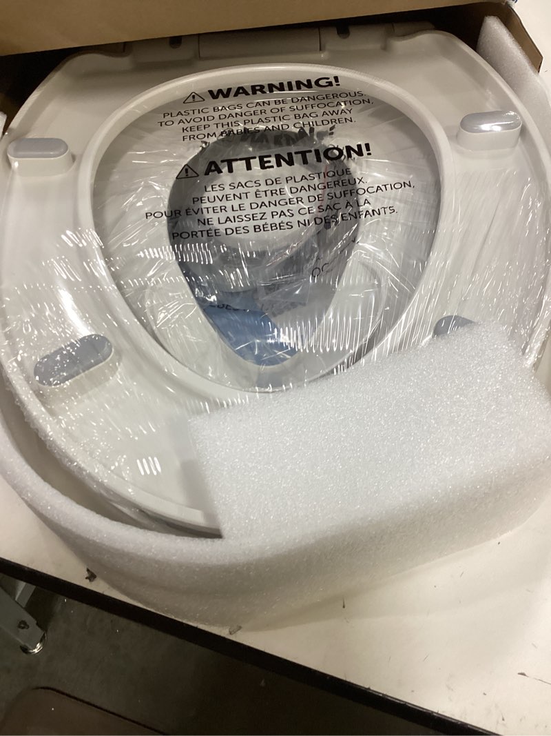 Condition photo showing New/Like New for quick flip toilet seat with built-in potty & splash guard for toddler training, slow close - jool baby (elongated)