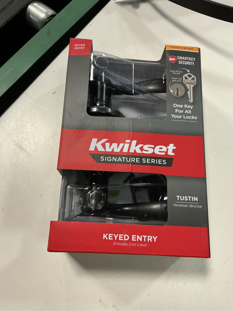 Condition photo showing As Is for kwikset smartkey tustin venetian bronze entry door knob kw1 1-3/4 in.