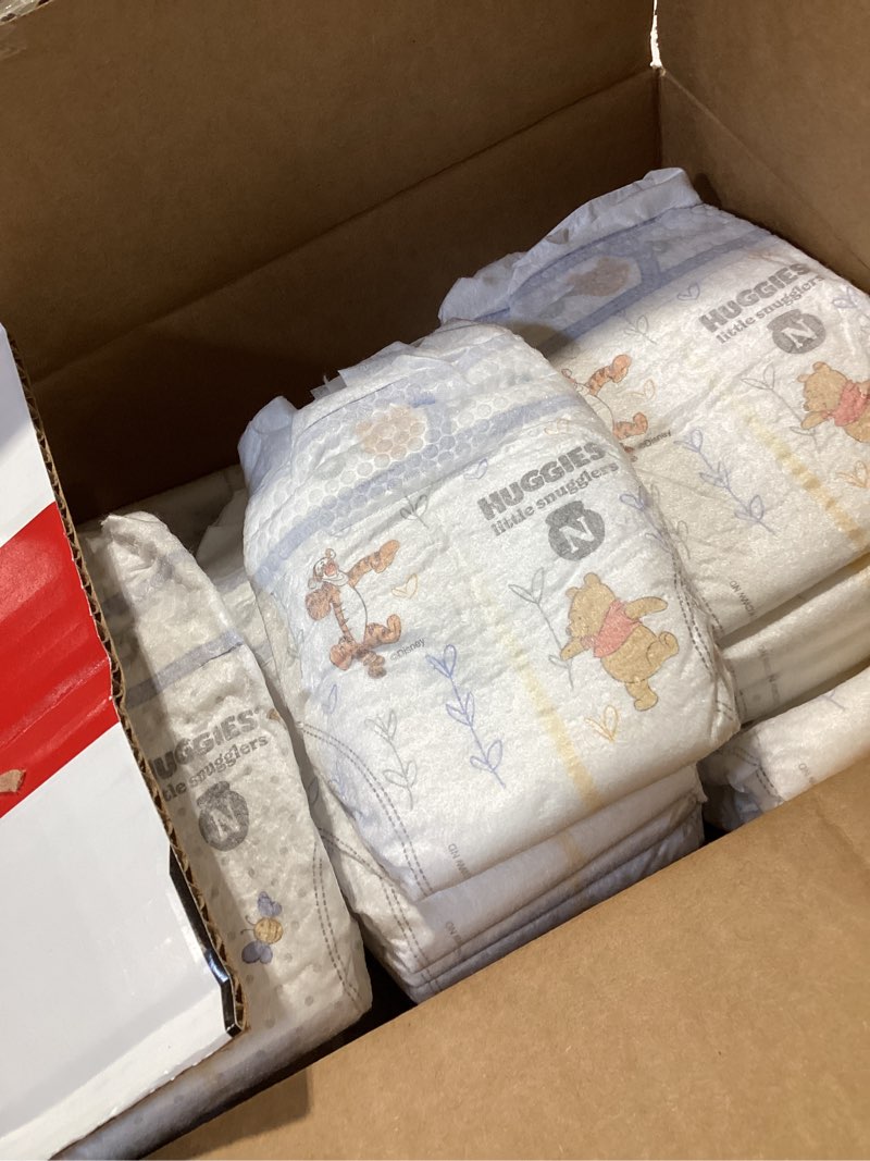 Condition photo showing As Is for Huggies Little Snugglers Diapers - Newborn - 84ct